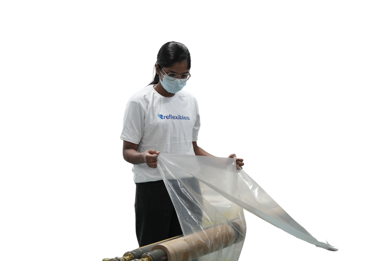 Reflexibles team member inspecting PCR film