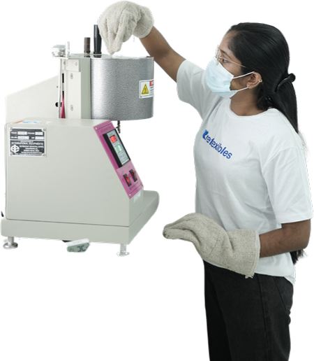 Lab technician testing melt flow index
